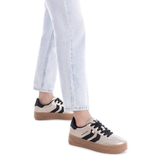 MUJER DEPORTIVA ORO